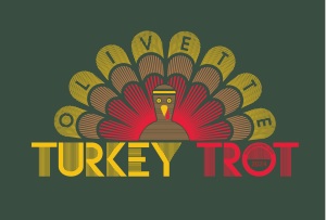 Logo of a turkey with a multicolored feather fan, the word 'LOVE IT' across the feathers, and 'TURKEY TROT' below.